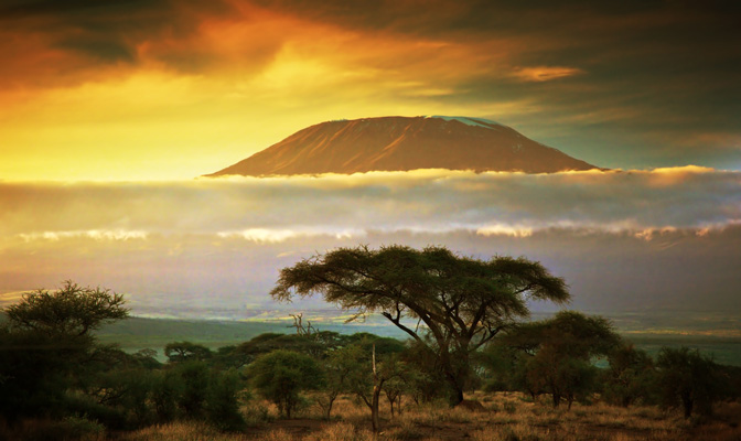 bigstock-Mount-Kilimanjaro-and-clouds-l-42312406.jpg